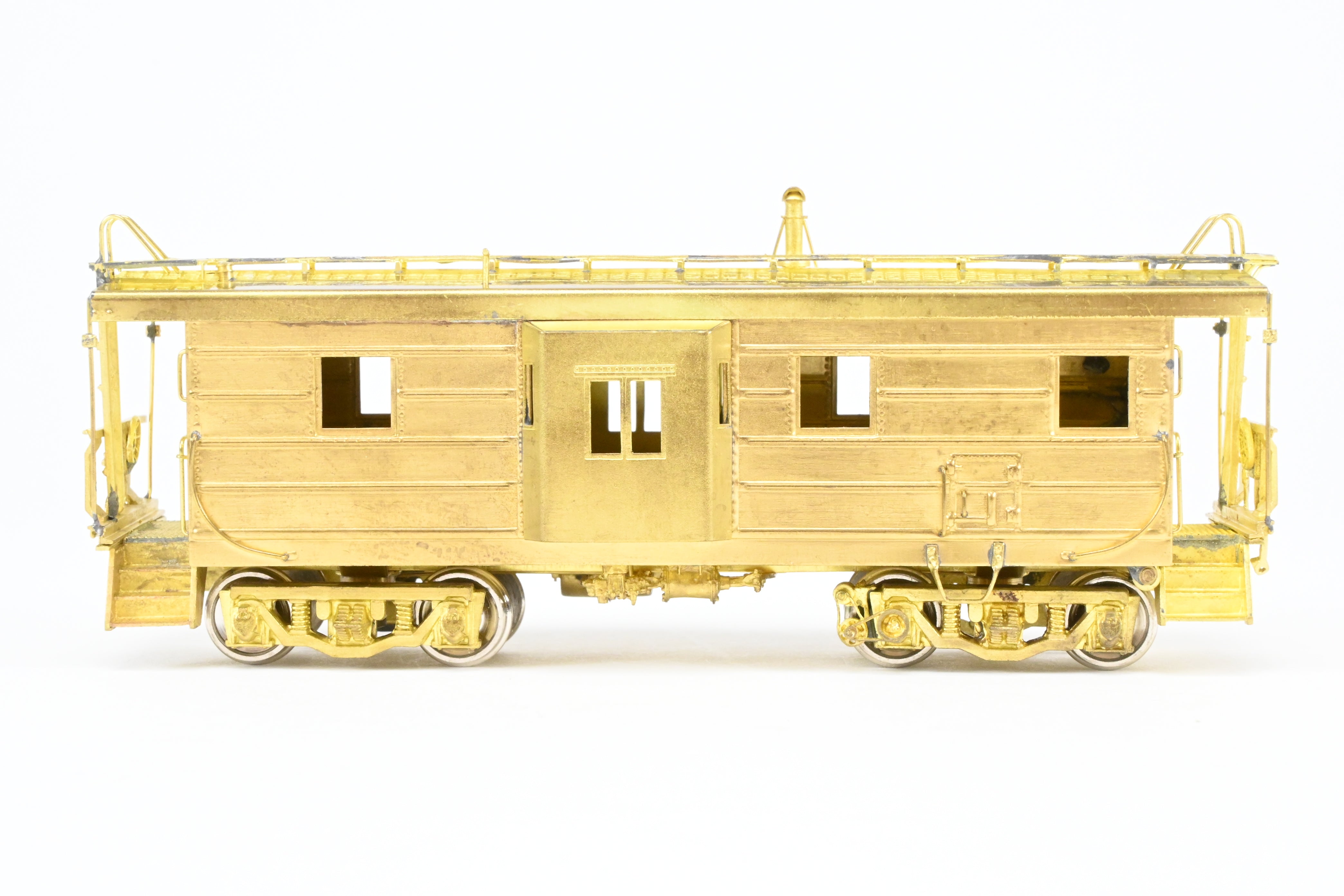 HO Brass OMI MILW - Milwaukee Road Bay Window Caboose with Drop Center Trucks (1991 Run)