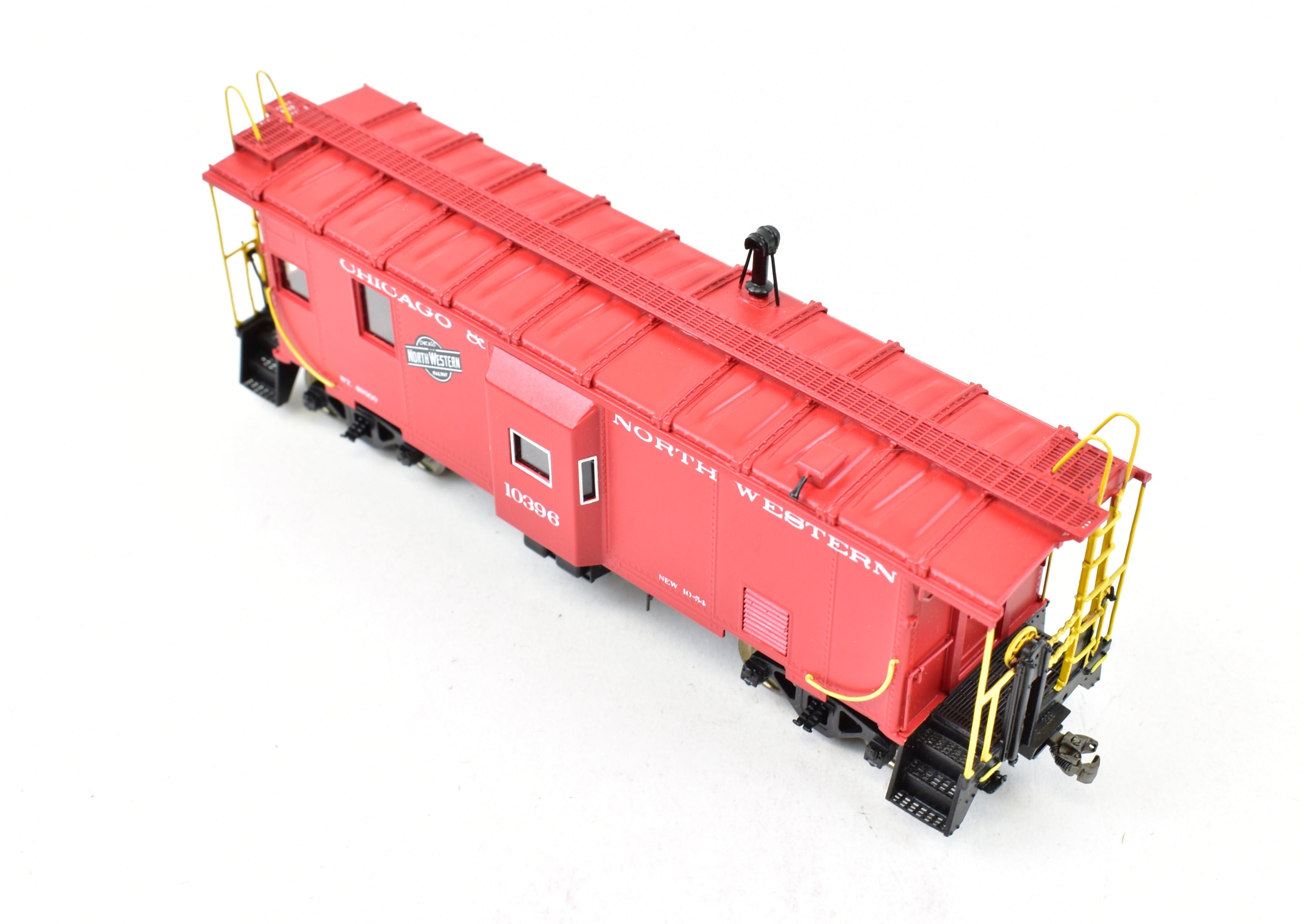 HO Scale Brass OMI - Overland Models, Inc. Chicago & North Western Steel Bay Window Caboose with Factory - Painted Bright Red Finish