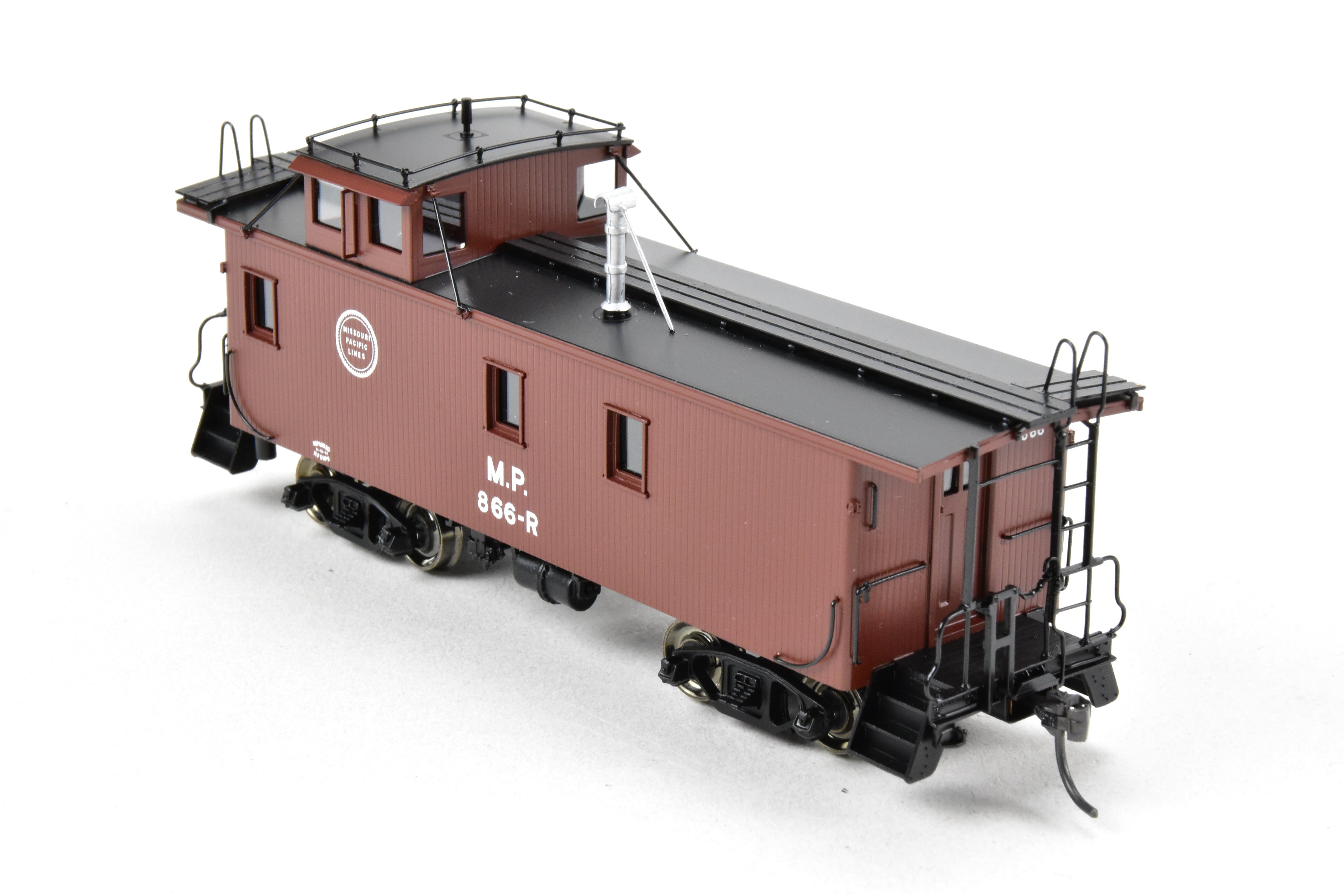 HO Scale Brass Missouri Pacific Wood - Side Caboose Model by Overland Models, Inc. with Angled Braces on Cupola and Antenna on Roof, Model Number #866R
