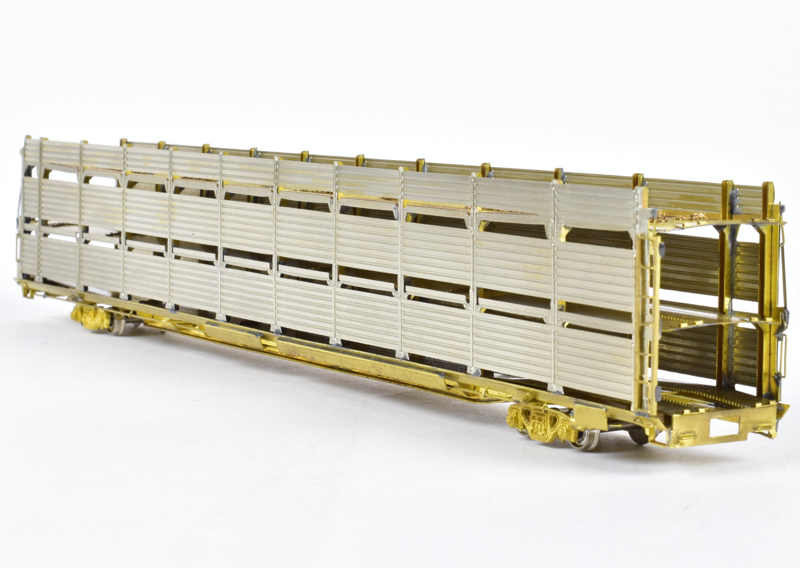 HO Scale Brass Tri - Level Auto Rack Model by Overland Models, Inc. (OMI) for Various Railroads like ATSF, BN, CR, N&W, and SP with Pressed Sides and Optional Roof