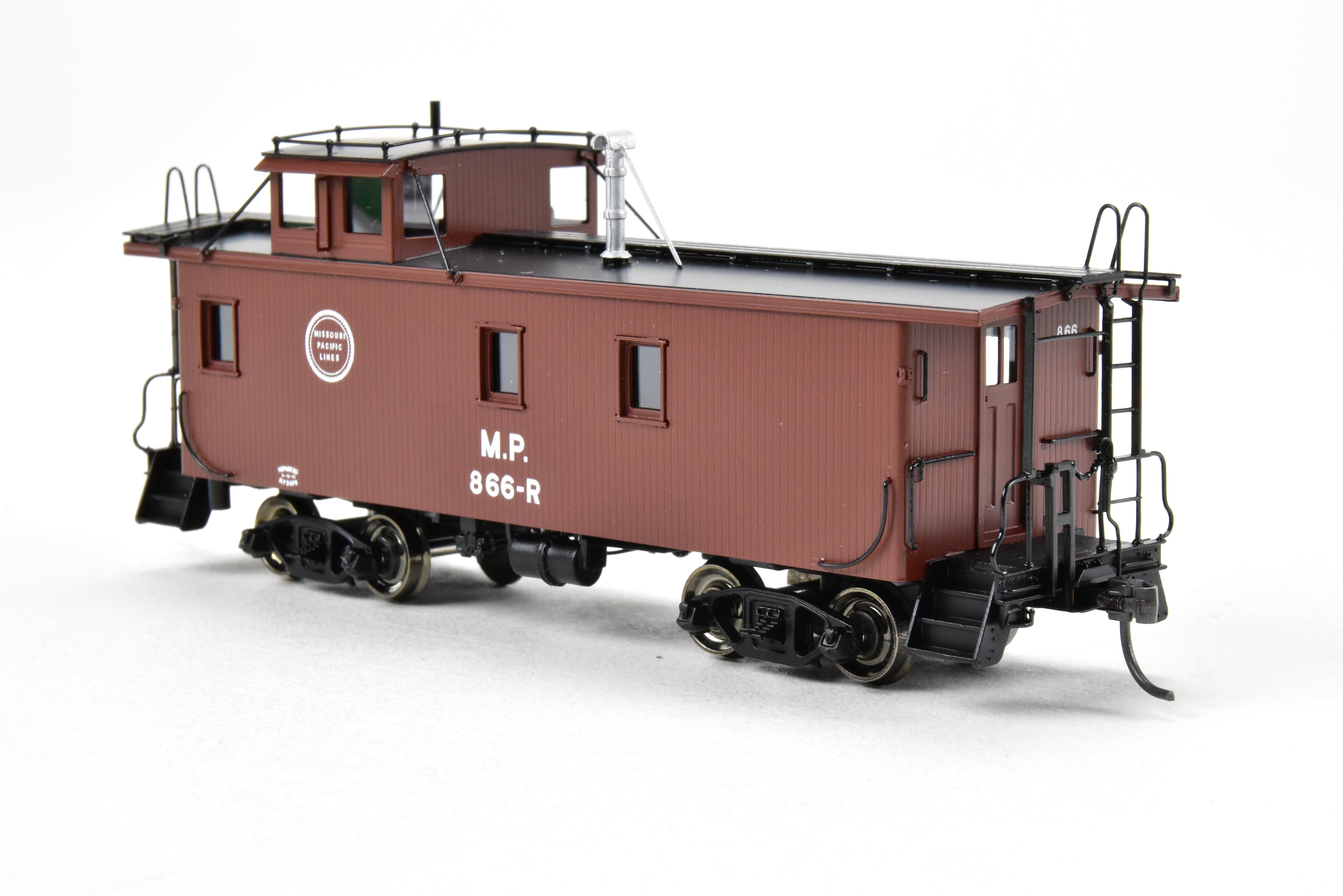 HO Scale Brass Missouri Pacific Wood - Side Caboose Model by Overland Models, Inc. with Angled Braces on Cupola and Antenna on Roof, Model Number #866R