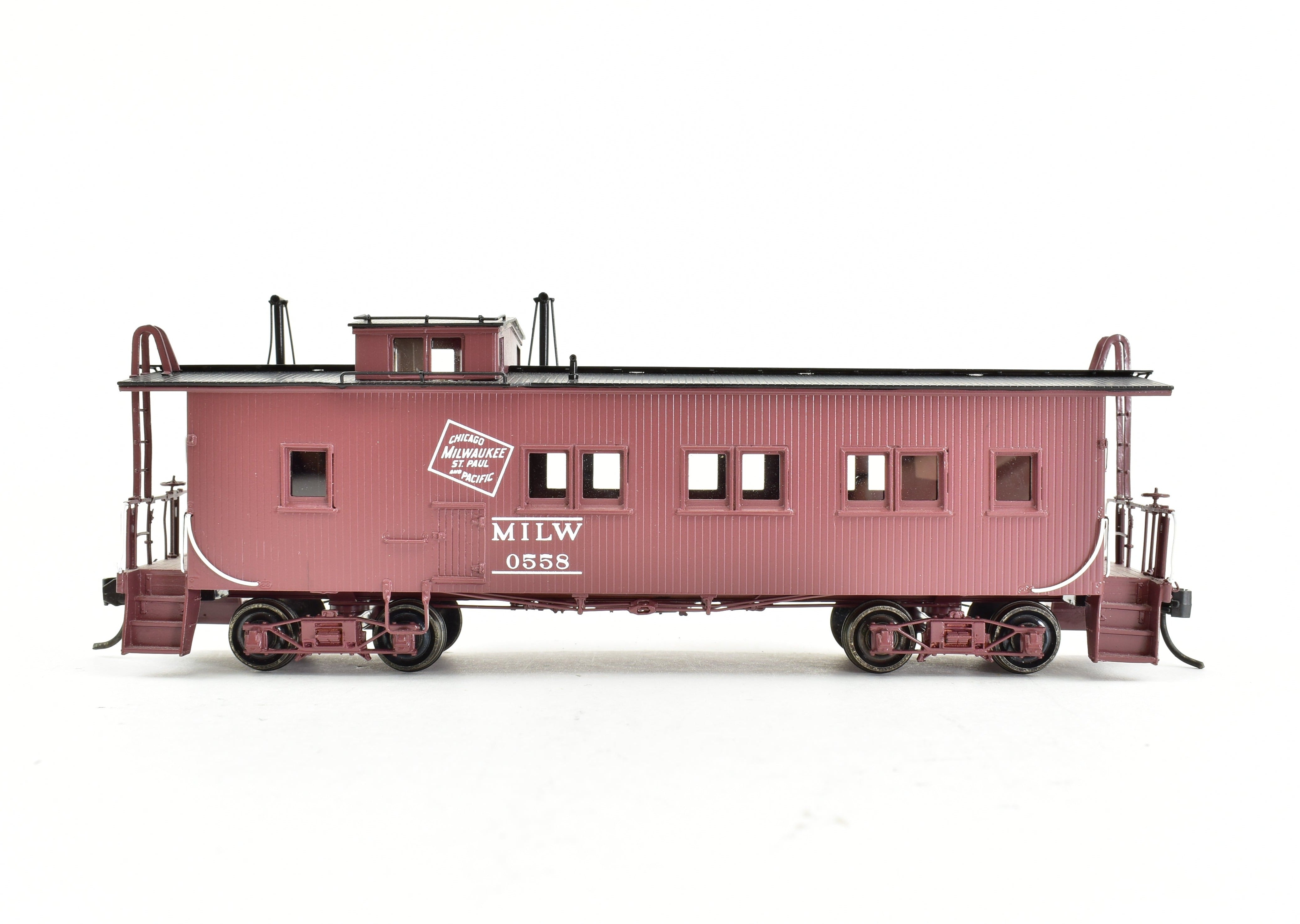 HO Scale Brass OMI Milwaukee Road 36' Wood Caboose No. 0558 by Overland Models