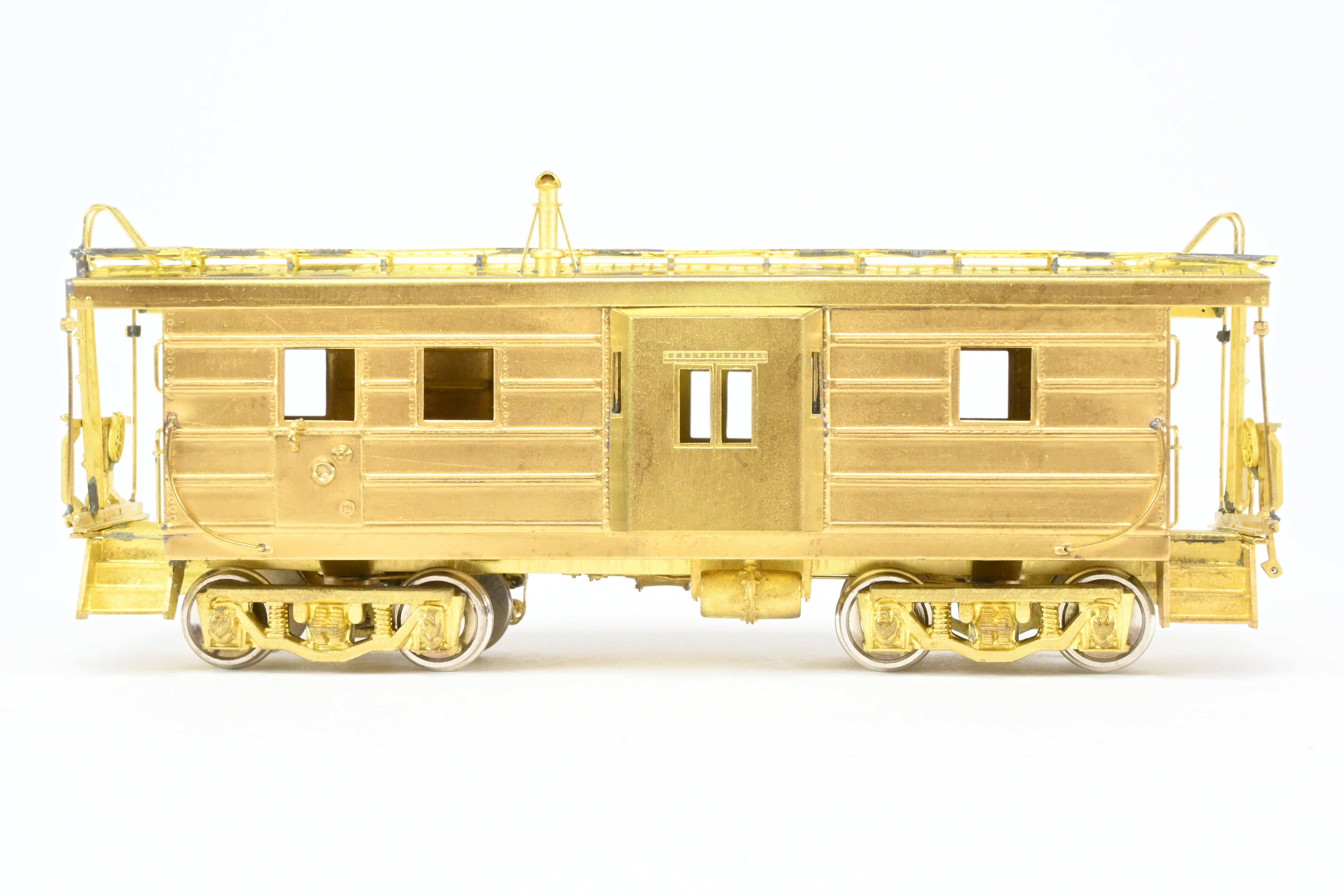 HO Brass OMI MILW - Milwaukee Road Bay Window Caboose with Drop Center Trucks (1991 Run)