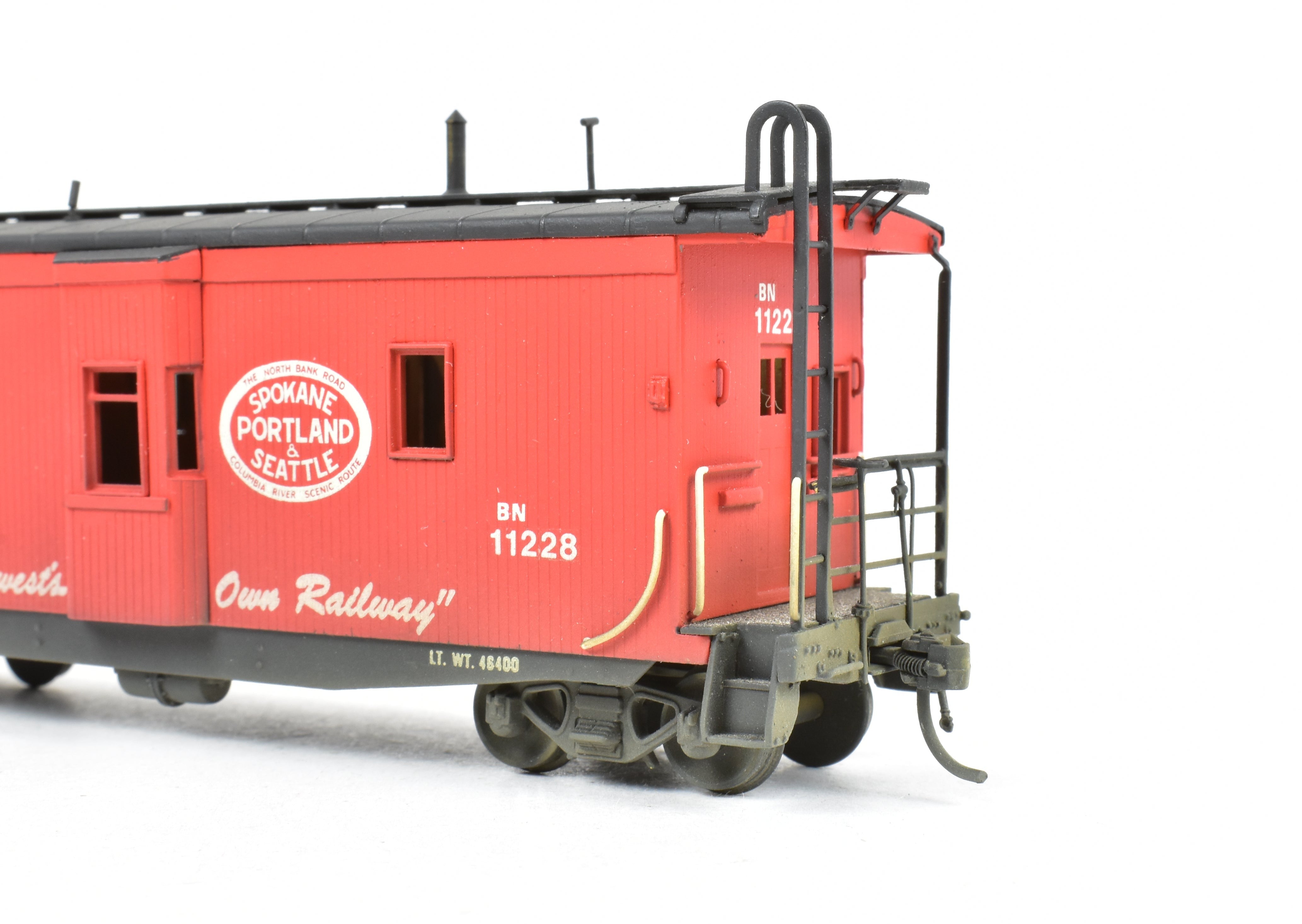 HO Scale Brass OMI - Overland Models, Inc. Model Train Spokane Portland & Seattle Wood Bay Window Caboose with Burlington Northern #11228 Design