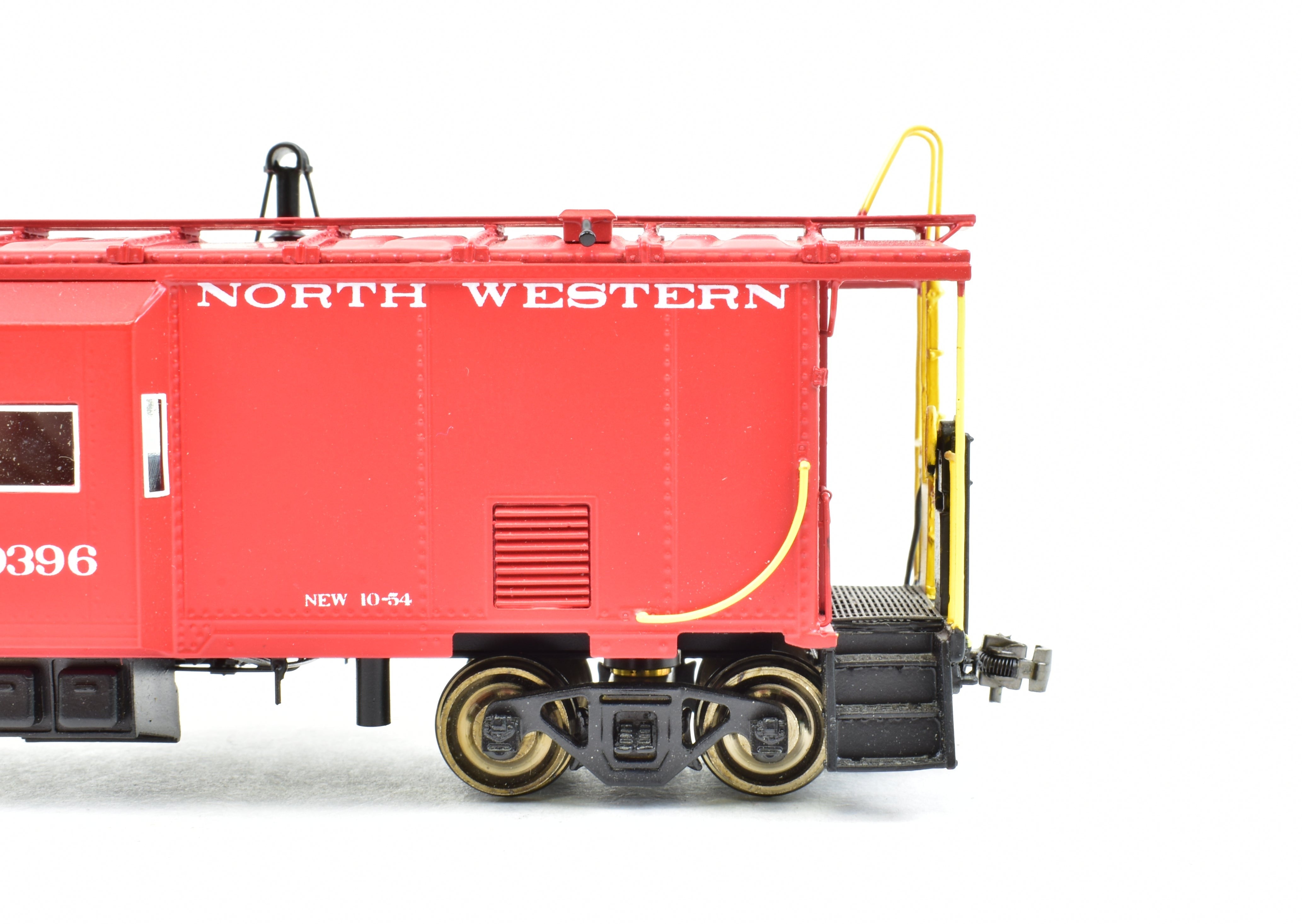 HO Scale Brass OMI - Overland Models, Inc. Chicago & North Western Steel Bay Window Caboose with Factory - Painted Bright Red Finish